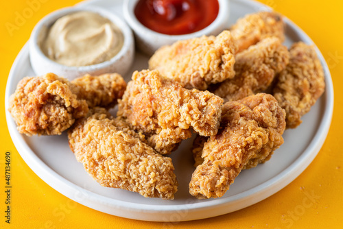 Kentuchy fried chicken wings on plate