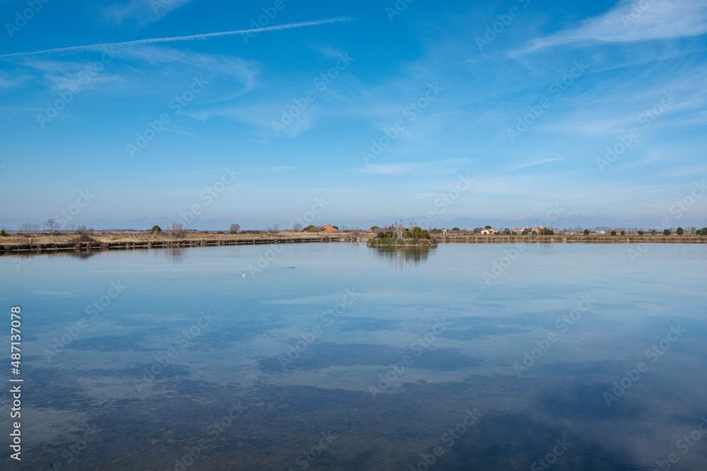 Lagoon landscape with blue sky, in Italy 