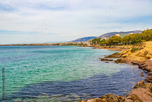 Natural green turquoise water Vouliagmeni Beach near to Voula Greece.