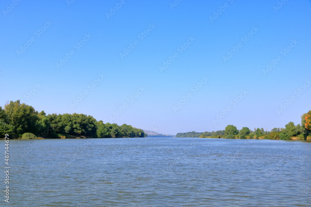 wide channel landscape in the Danube Delta, Romania, Europe