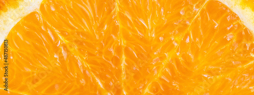 Close up of orange in section. Natural background. photo