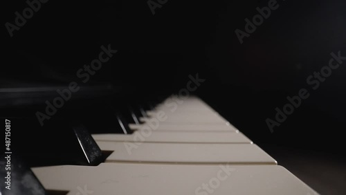 Piano keyboard close-up. Close-up of a piano keyboard. Piano keys. photo