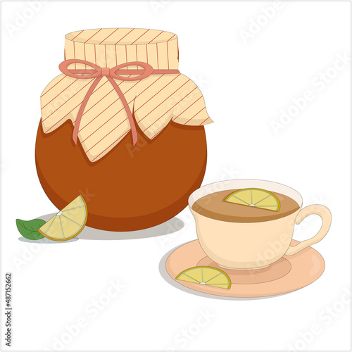 a jar of lemon jam with a mug of hot tea
