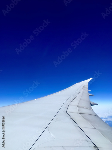 Blue sky from airplane window.