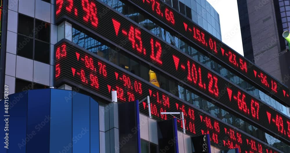 A view of a changing stock market ticker. Numbers are fictional and do not represent any particular stock. Bull and bear market concept.	