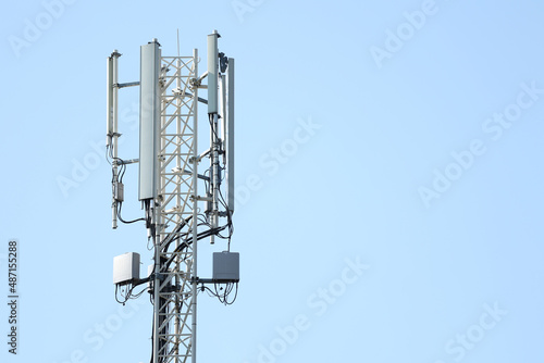 Telecommunication tower of 4G and 5G cellular. 5G radio network telecommunication equipment with radio modules and smart antennas mounted on a metal. Macro Base Station.