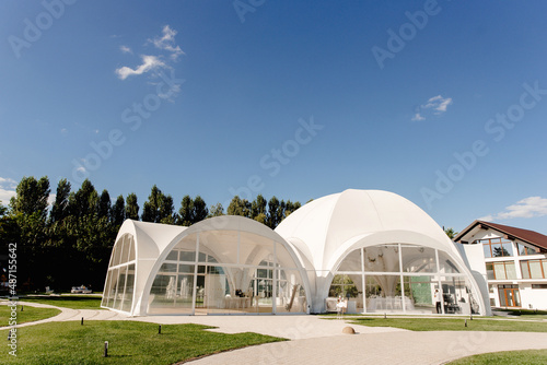 White tent wedding restaurant, Outdoor wedding reception in tent.