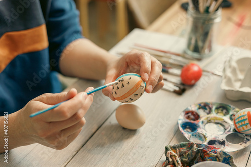 Canvas Print Process of painting easter egg