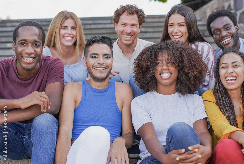 Fototapeta premium Group of happy multiracial people laughing on camera outdoor - Diversity and friendship concept