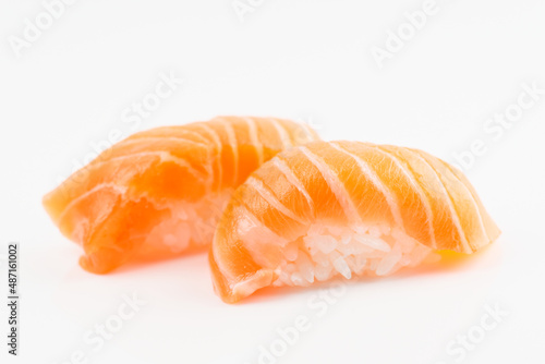 Salmon sushi shot on light background