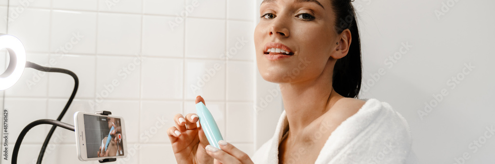Young smiling young white woman beauty blogger Young smiling young white woman beauty blogger