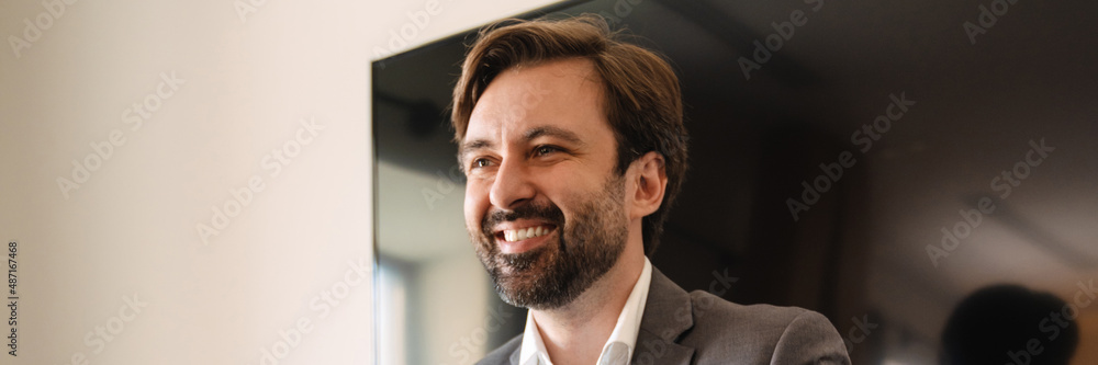 Fototapeta premium Smiling mid aged white businessman