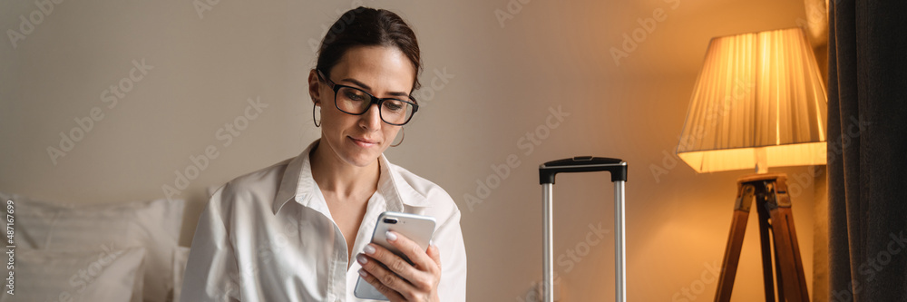 Smiling mid aged brunette white businesswoman Smiling mid aged brunette white businesswoman