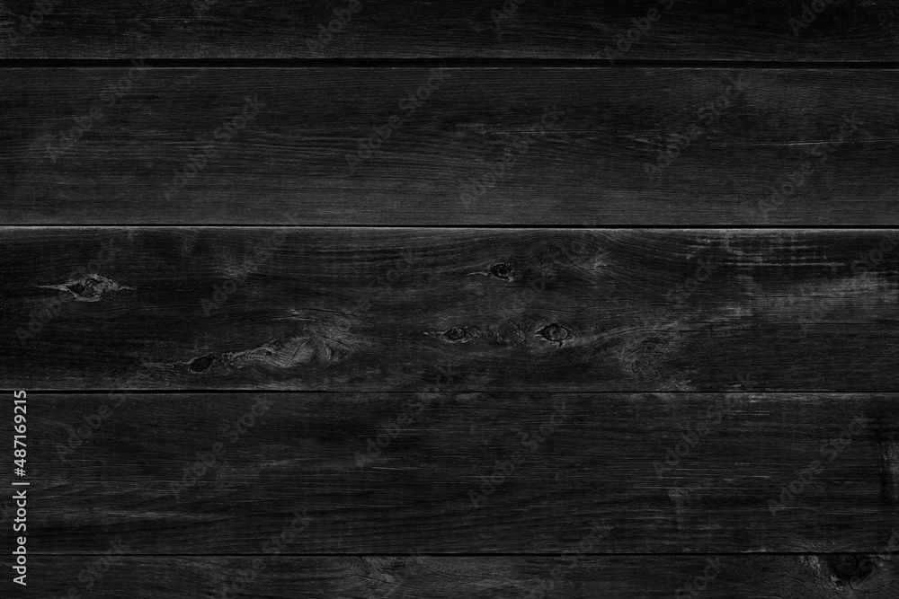Naklejka premium old black rustic dark wooden boards texture - wood timber background
