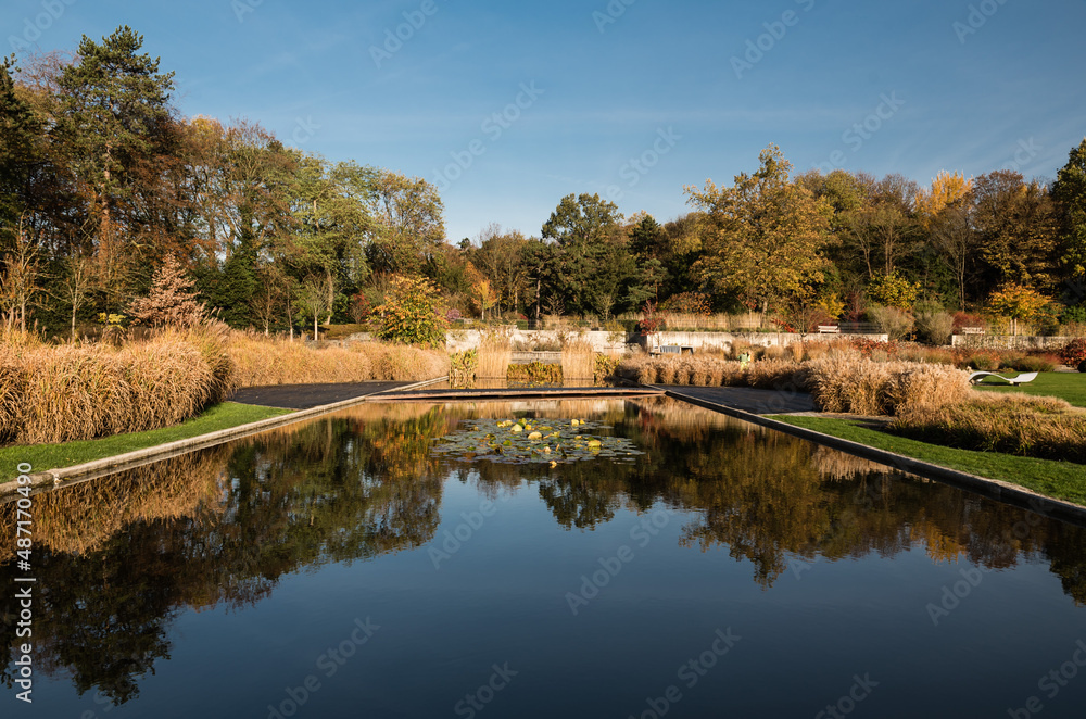 Panoramic view over the Stuyvenbergh city park with reflecting colorful autumn trees, Brussels, Belgium