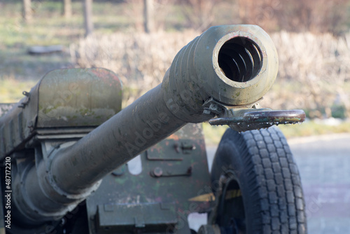 Fototapeta Naklejka Na Ścianę i Meble -  Defense of country, modern battle gun, cannon barrel.