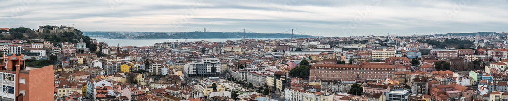 Lisbon, Portugal - 12 27 2018: Extra large panoramic view of the city skyline taken from the mirador da Graca