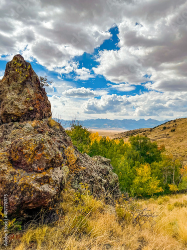 Views of the Rocky Mountains with Rock Formation and Aspen Trees photo