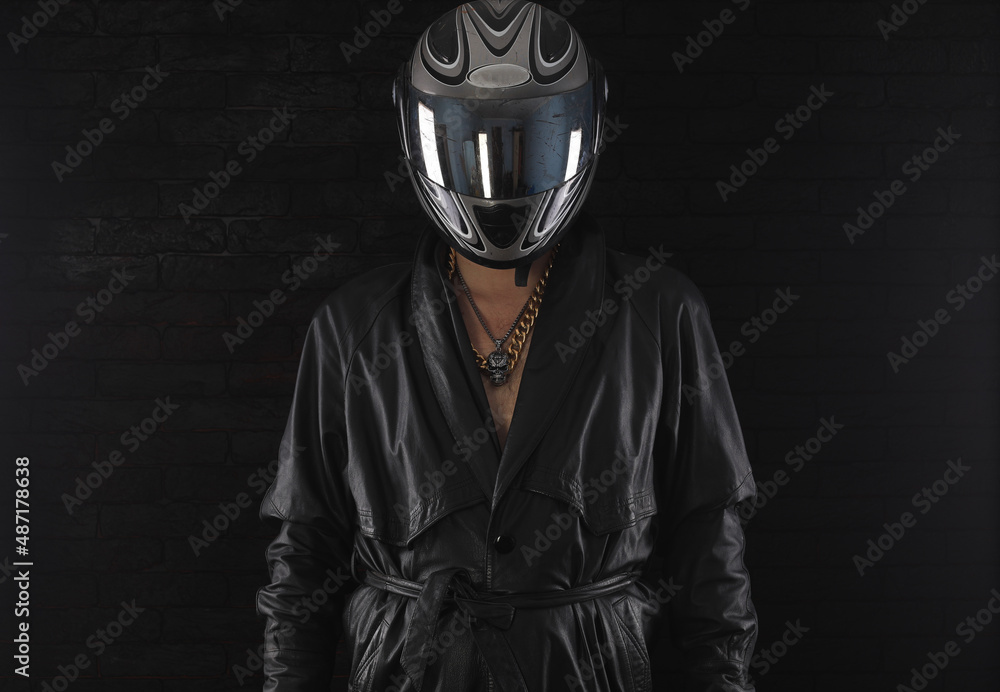 portrait of a professional racer in a motorcycle helmet