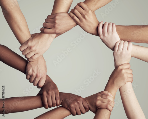 As a team. Cropped shot of unrecognizable businesspeople coming together as a team.