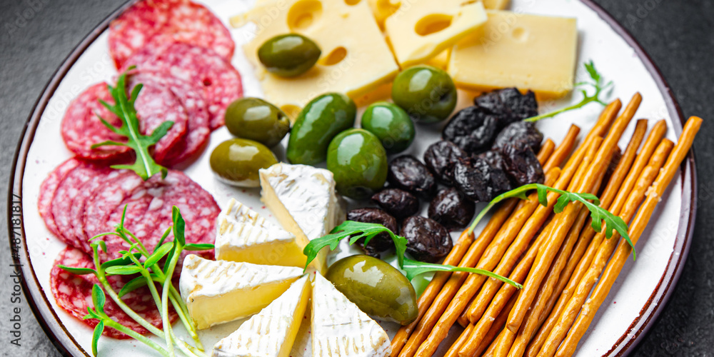 snack plate cheese, sausage, olive, bread stick fresh appetizer healthy meal food diet snack on the table copy space food background rustic snack plate cheese, sausage, olive, bread stick fresh appetizer healthy meal food diet snack on the table copy space food background rustic