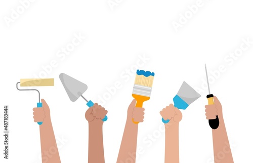 Group of construction workers with a tool in hands isolated on white background.