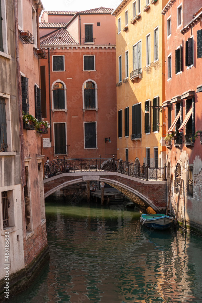 Boat and bridge in a canal, Venice, Italy