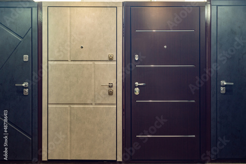 Entrance doors for sale in a specialized store.