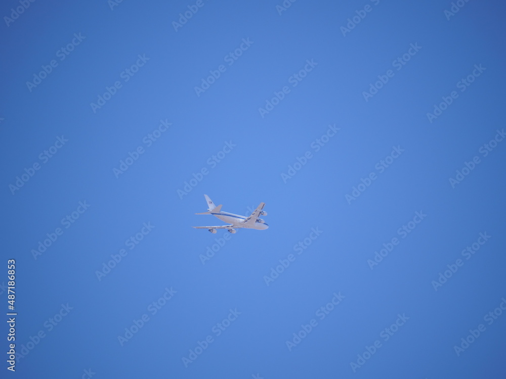 Midsize jet plane flies high above the midwest. Midsize jet plane flies high above the midwest.