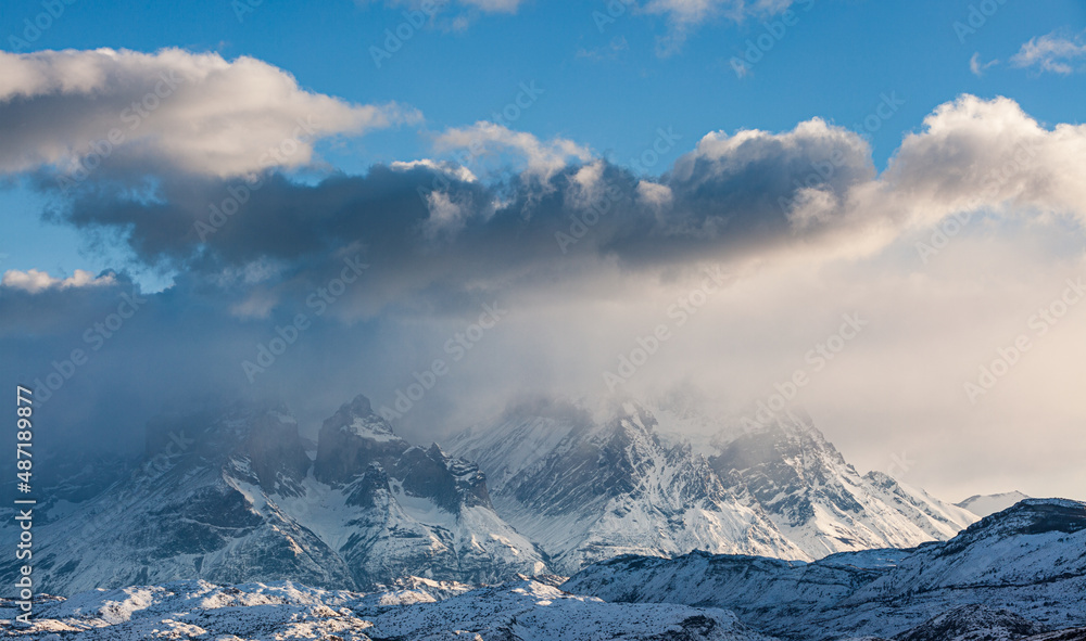 Winter in Patagonia: cloudscape over the iconic Paine mountain range, Torres del Paine National Park, Chile
