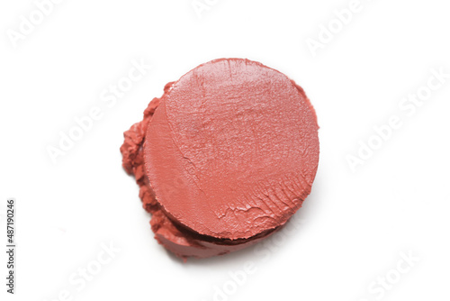 Brown creamy makeup sample isolated on white background. Decorative cosmetic smear.