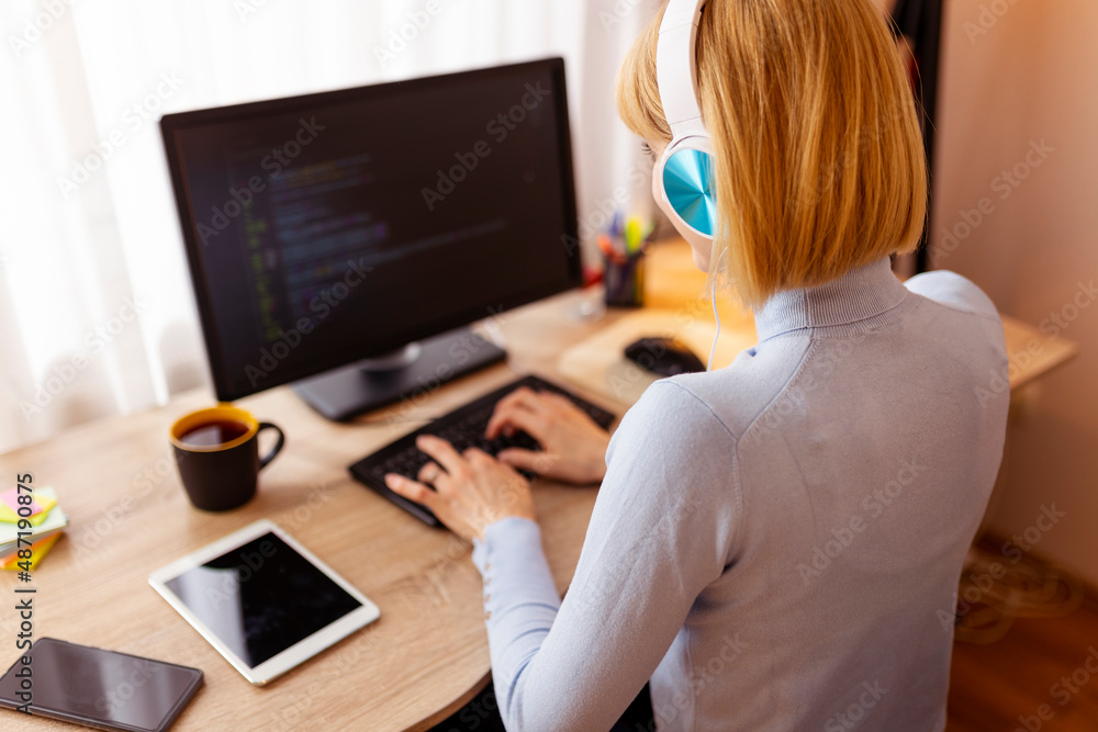 Female web developer working Female web developer working