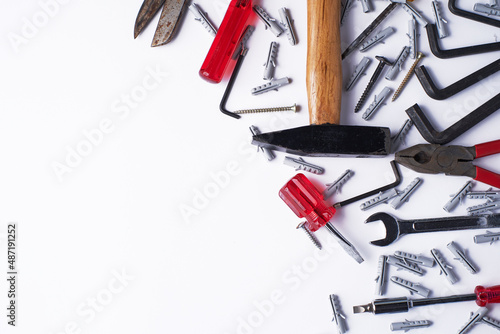 Foto Variety of tools on white background