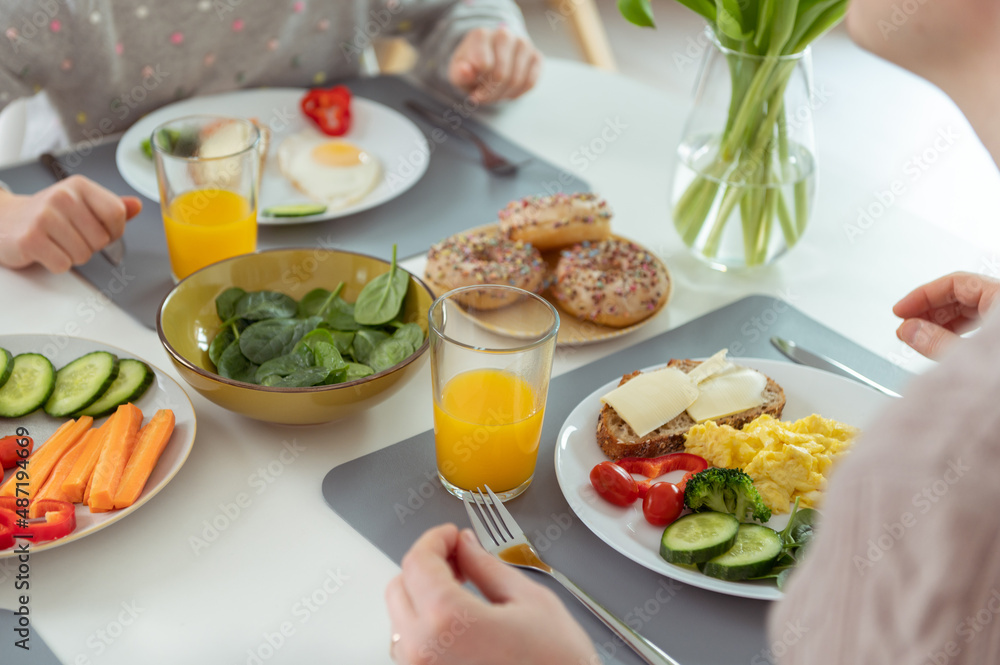 Young family is going to start morning breakfast Young family is going to start morning breakfast