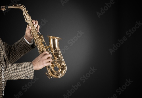 Musician playing jazz music instrument. Band instruments