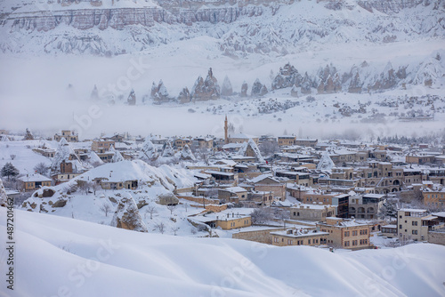 Pigeon Valley and Cave town in Goreme during winter time. Cappadocia, Turkey. Open air museum, Goreme national park. Heavenly landscape
