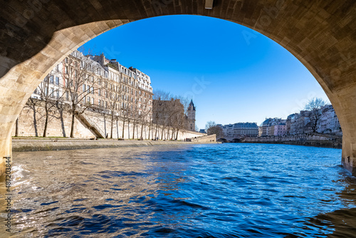 Paris, under the Pont-Neuf on the Seine, with the quai des Orfevres and the tribunal on the ile de la Cité
