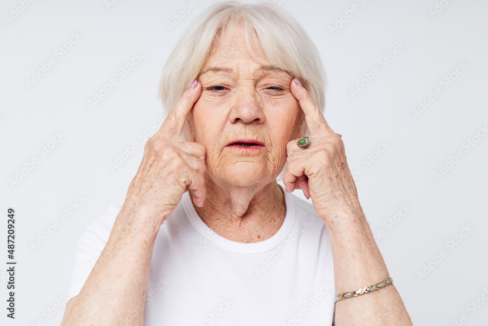 emotional elderly woman health lifestyle ophthalmologist sees treatment light background emotional elderly woman health lifestyle ophthalmologist sees treatment light background