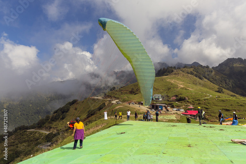 A famous paragliding site with tourists arrive to enjoy the paragliding, Palampur, India photo