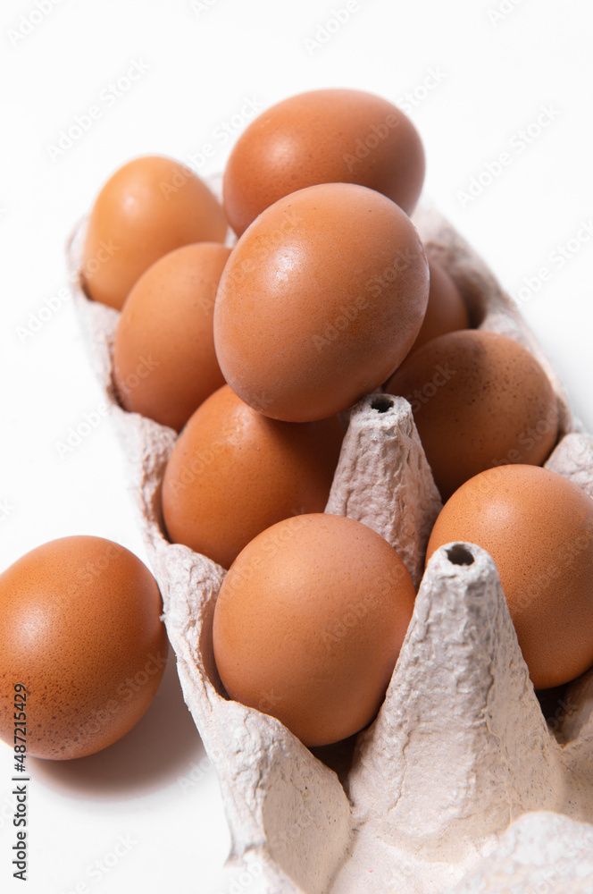 Eggs brown together on white background vertical Eggs brown together on white background vertical