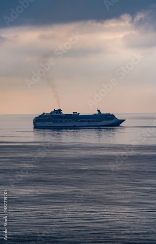 Cruise ship sails through the Mediterranean Sea, Malaga. Sea vacation concept