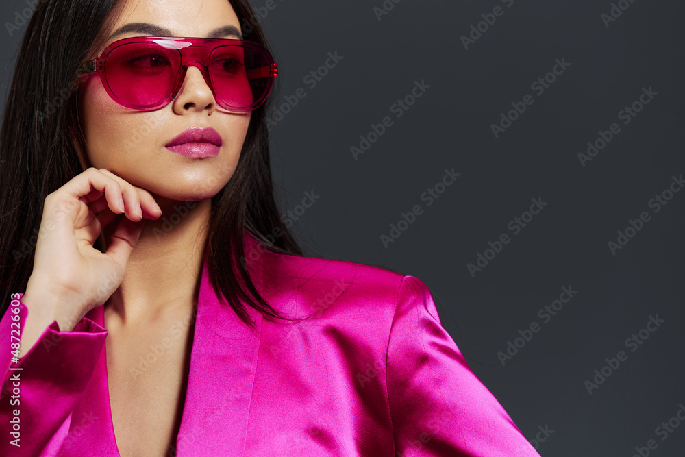 beautiful woman bright makeup pink mini dress modern style Gray background
