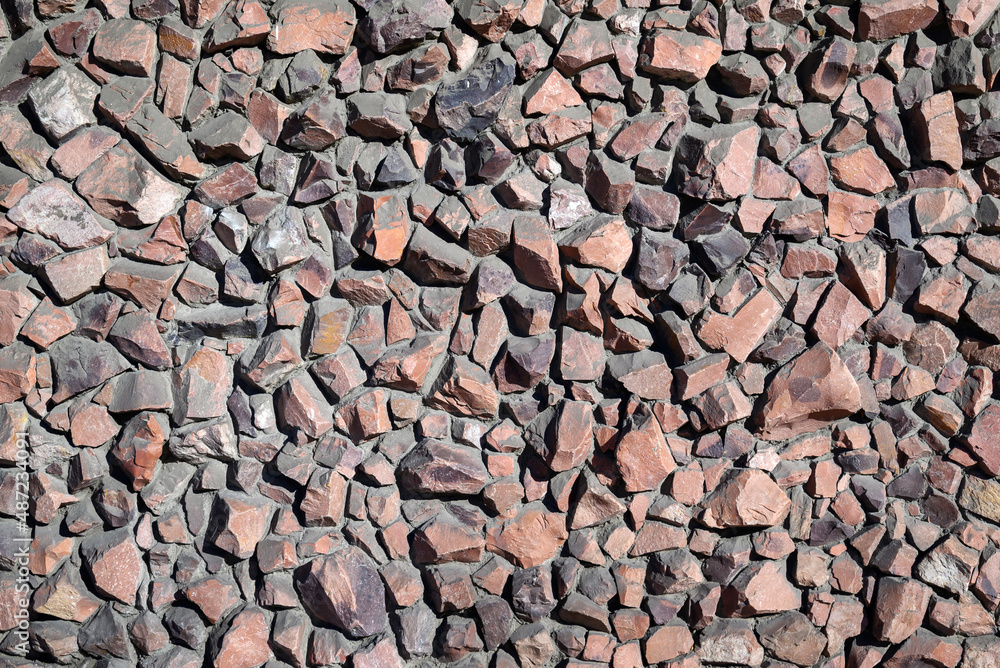 wall of red granite stones background and texture wall of red granite stones background and texture