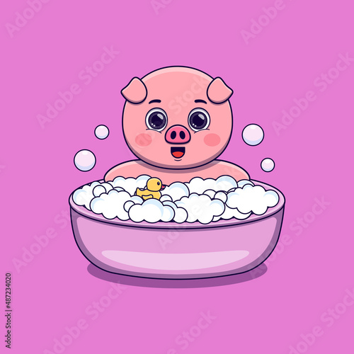 cute pig taking bath with duck toy and bubbles