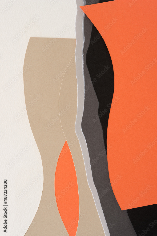 paper design suitable as a background with blank space featuring undulating lines in beige, gray, and orange paper design suitable as a background with blank space featuring undulating lines in beige, gray, and orange