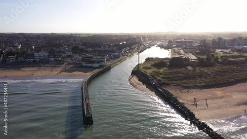 Wallpaper Mural aerial view from the ocean of courseulles-sur-mer with a beautiful sunset Torontodigital.ca