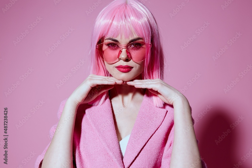 Beautiful fashionable girl in pink glasses cosmetics glamor emotions Studio Model unaltered Beautiful fashionable girl in pink glasses cosmetics glamor emotions Studio Model unaltered