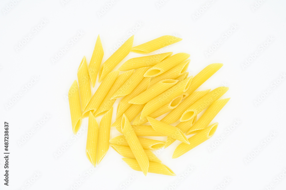 Raw penne rigate pasta, isolated on a white background
Raw penne rigate pasta, isolated on a white background