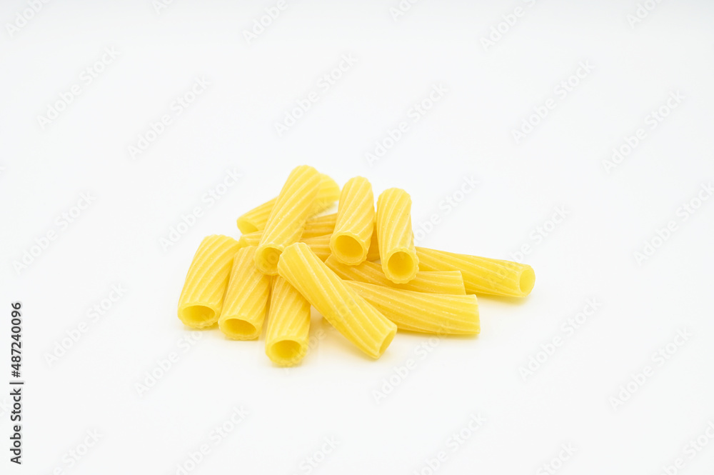 Raw Tortiglioni pasta, isolated on a white background Raw Tortiglioni pasta, isolated on a white background
