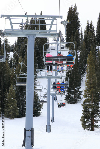 Skiers on Winter Ski Lift